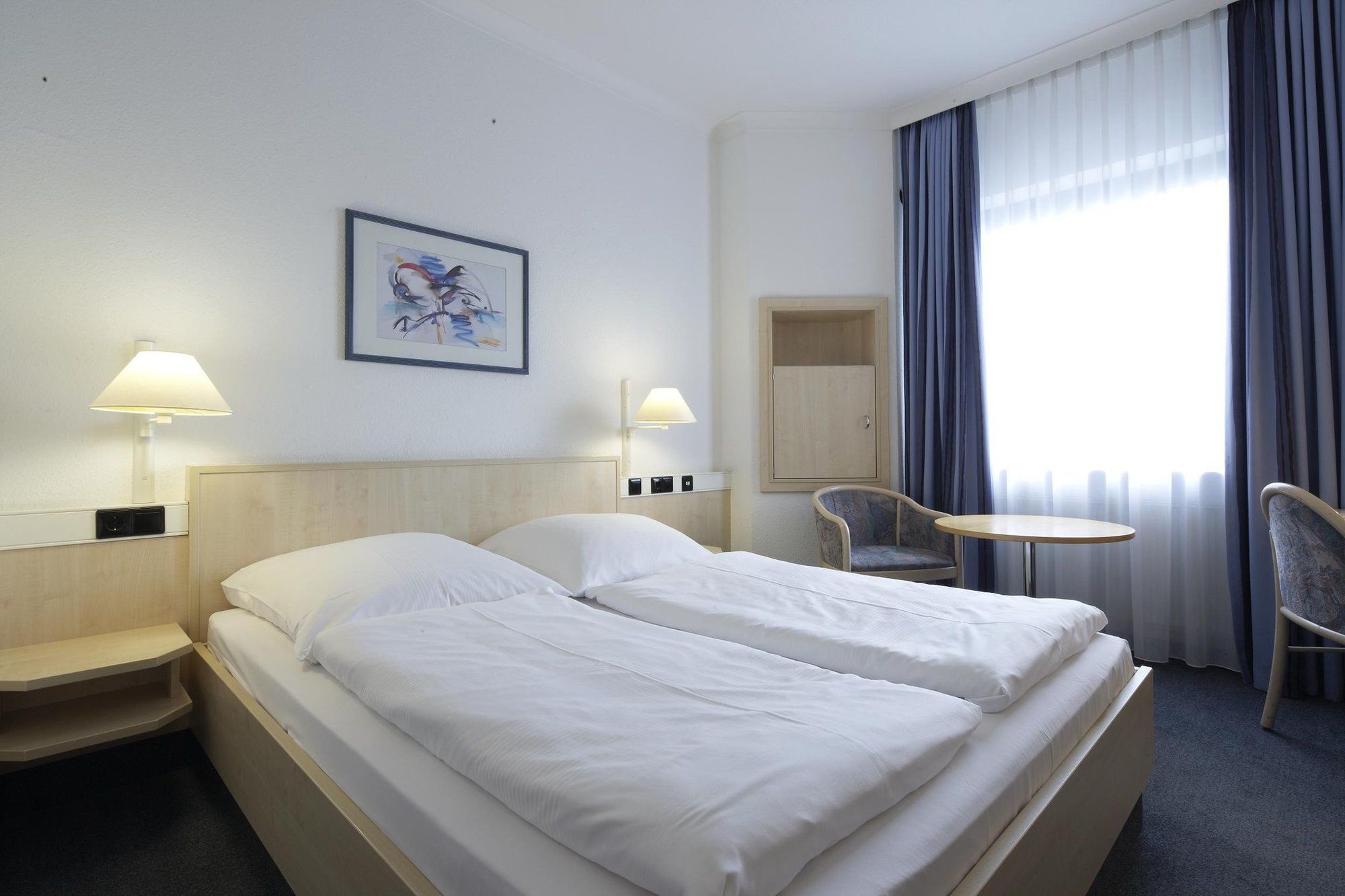 Intercityhotel Ульм Номер фото